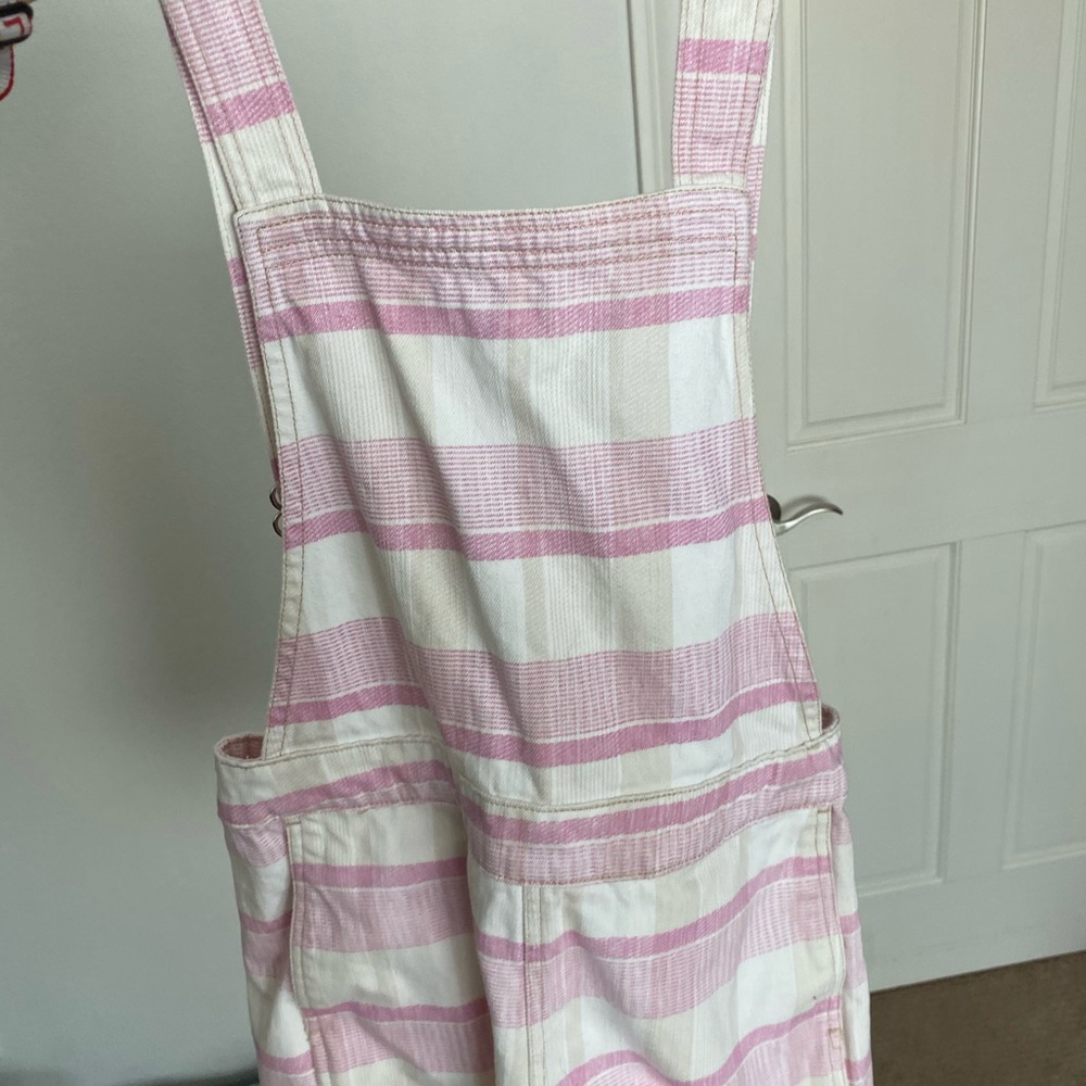 pink and white striped overalls